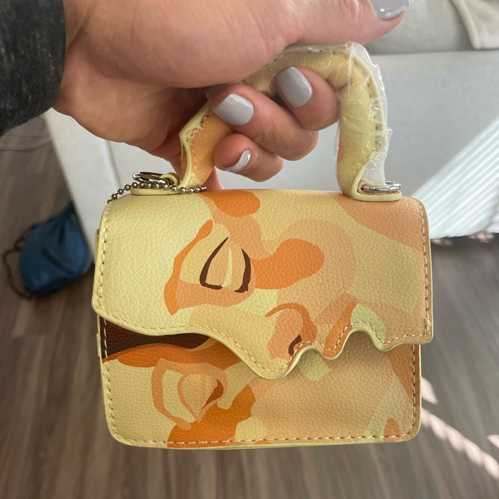 Kid Super kissing face mini bag